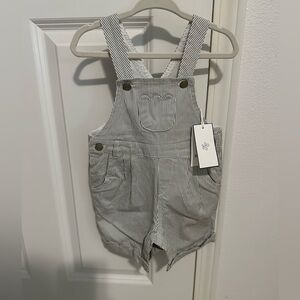 Tartine et Chocolat Striped Overall (jumpsuit) stripes. I believe it’s unisex.